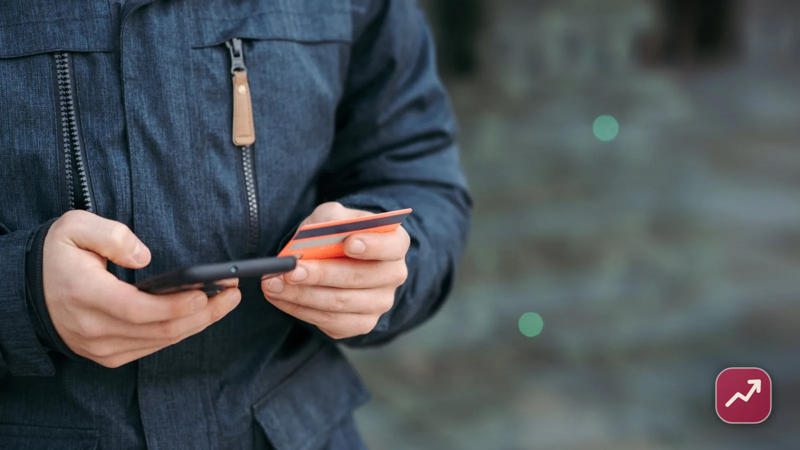 Une personne effectue un virement bancaire depuis l’application de sa banque sur son téléphone, illustrant comment envoyer de l’argent instantanément et en sécurité.